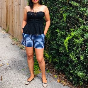 Black tube and Nike shorts